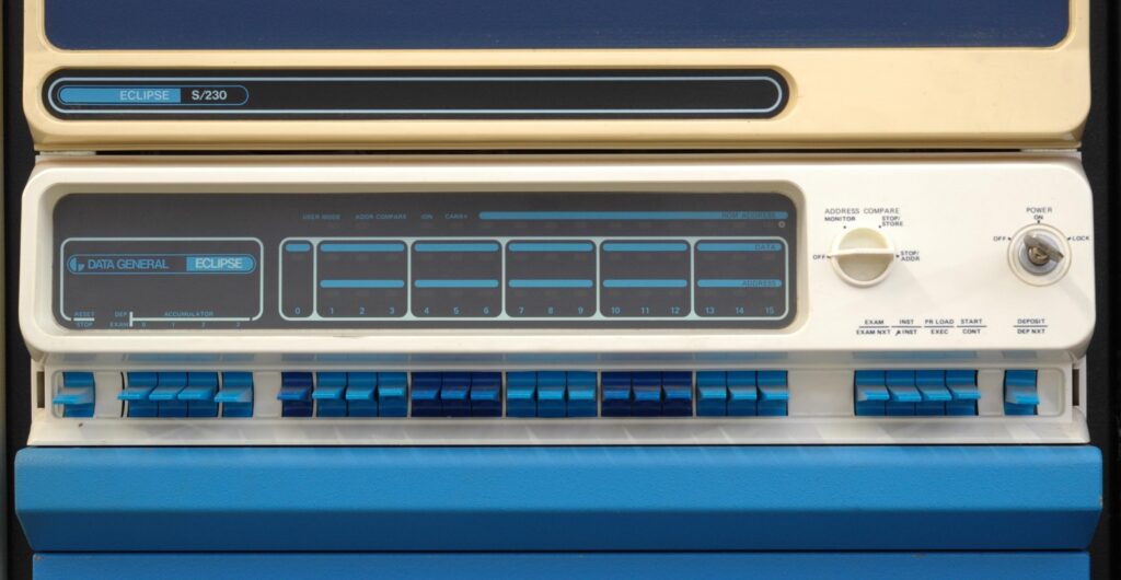 A data console with bright pastel-blue buttons.